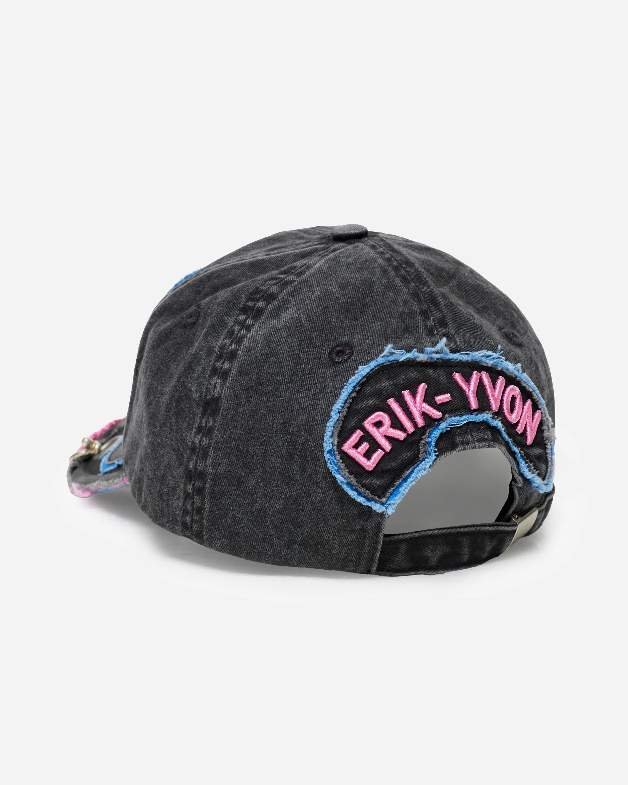 Black denim cap with 'ERIK-YVON' embroidery on a white background