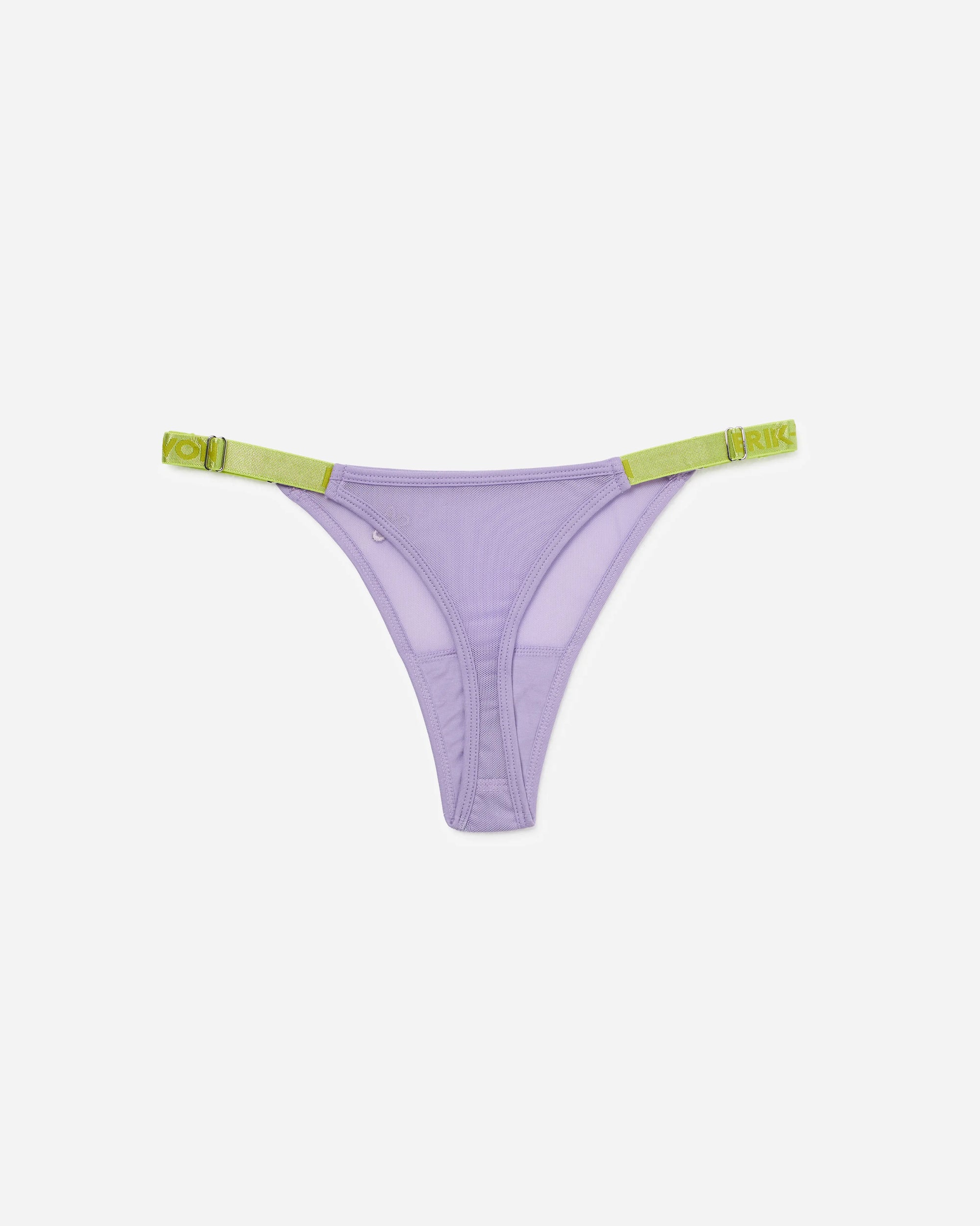 A pair of thong underwear in a light lavender purple mesh fabric, featuring lime green elastic side bands with silver-tone metal rings, displayed flat against a light grey background.